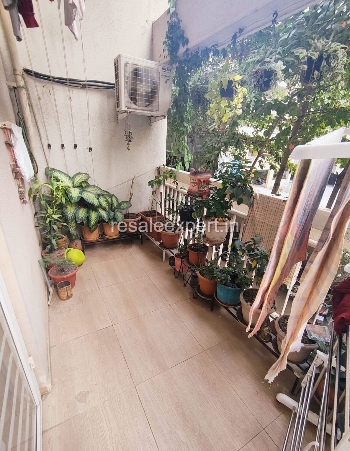Spacious balcony attached to Furnished 2 BHK Flat in Tathawade living room