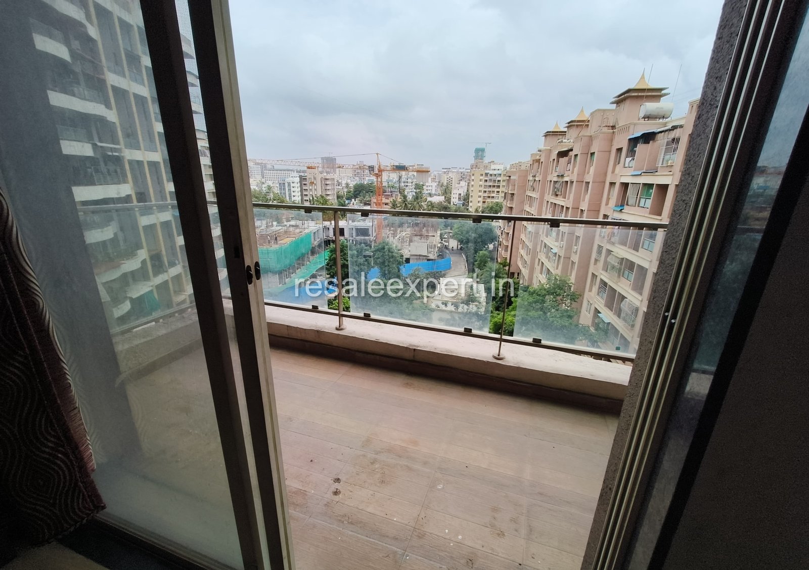 Garden-facing balcony in Rahatani 2 BHK Flat with Immediate Possession