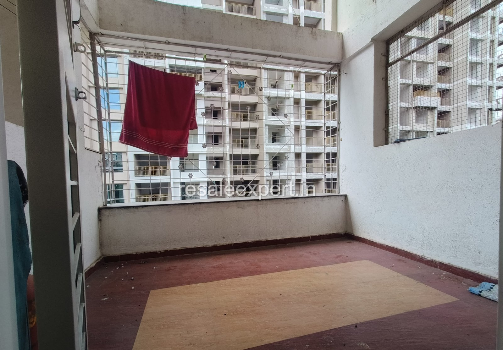 Cozy balcony perfect for morning tea or planters in Rahatani flat