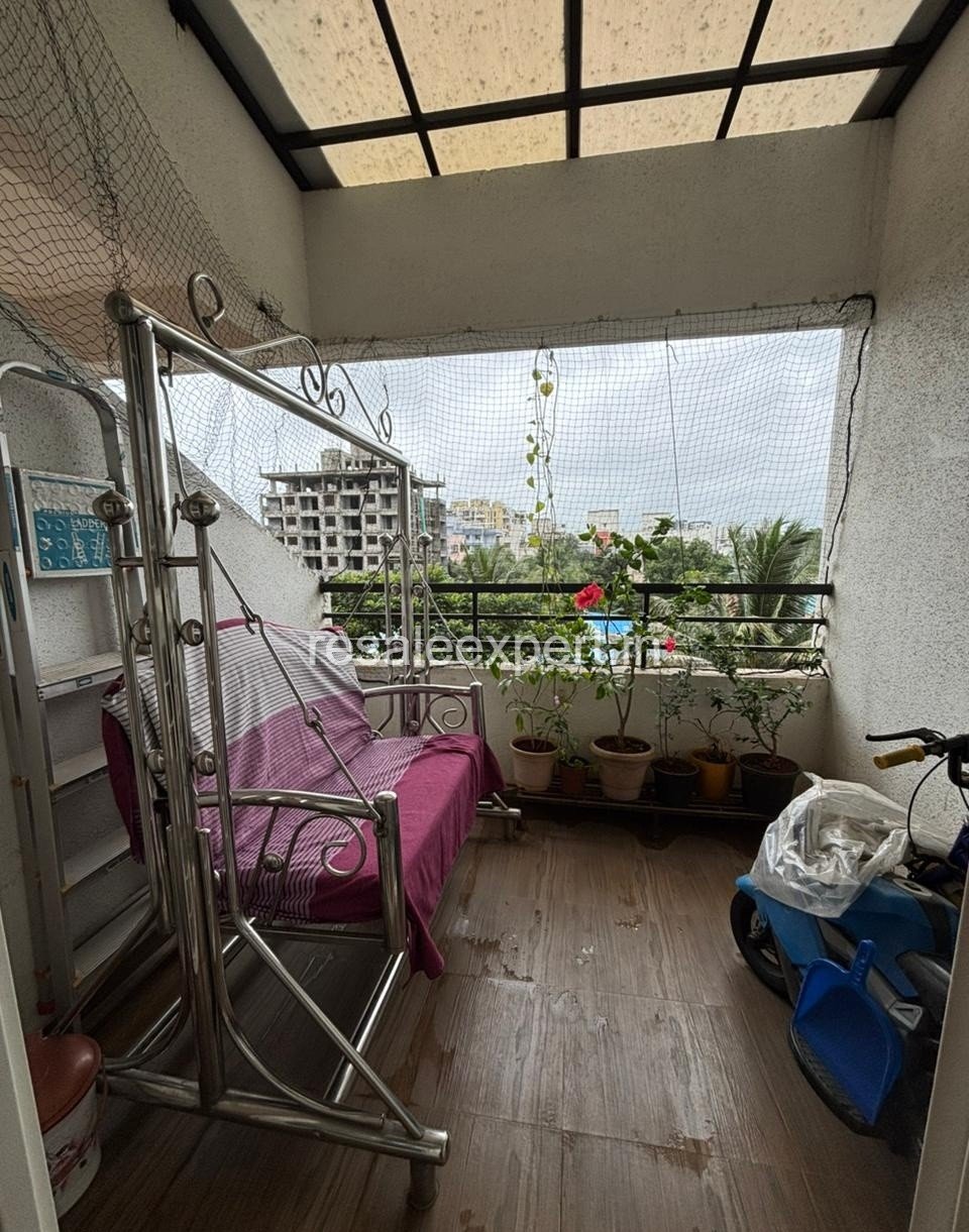 Balcony seating area of semi-furnished 2.5 BHK apartment Pimple Nilakh