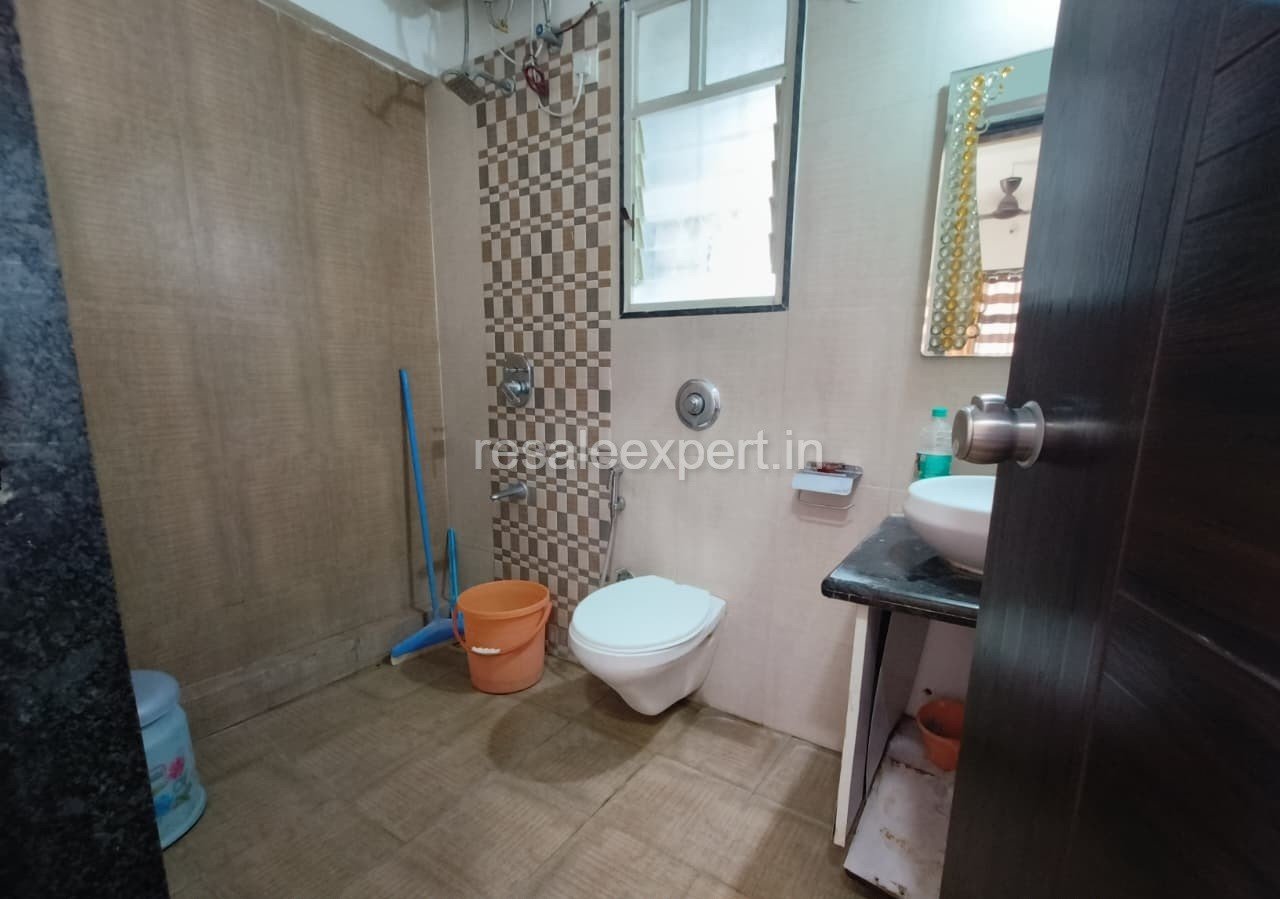 Well-designed bathroom of 2 BHK Furnished Flat in Rahatani