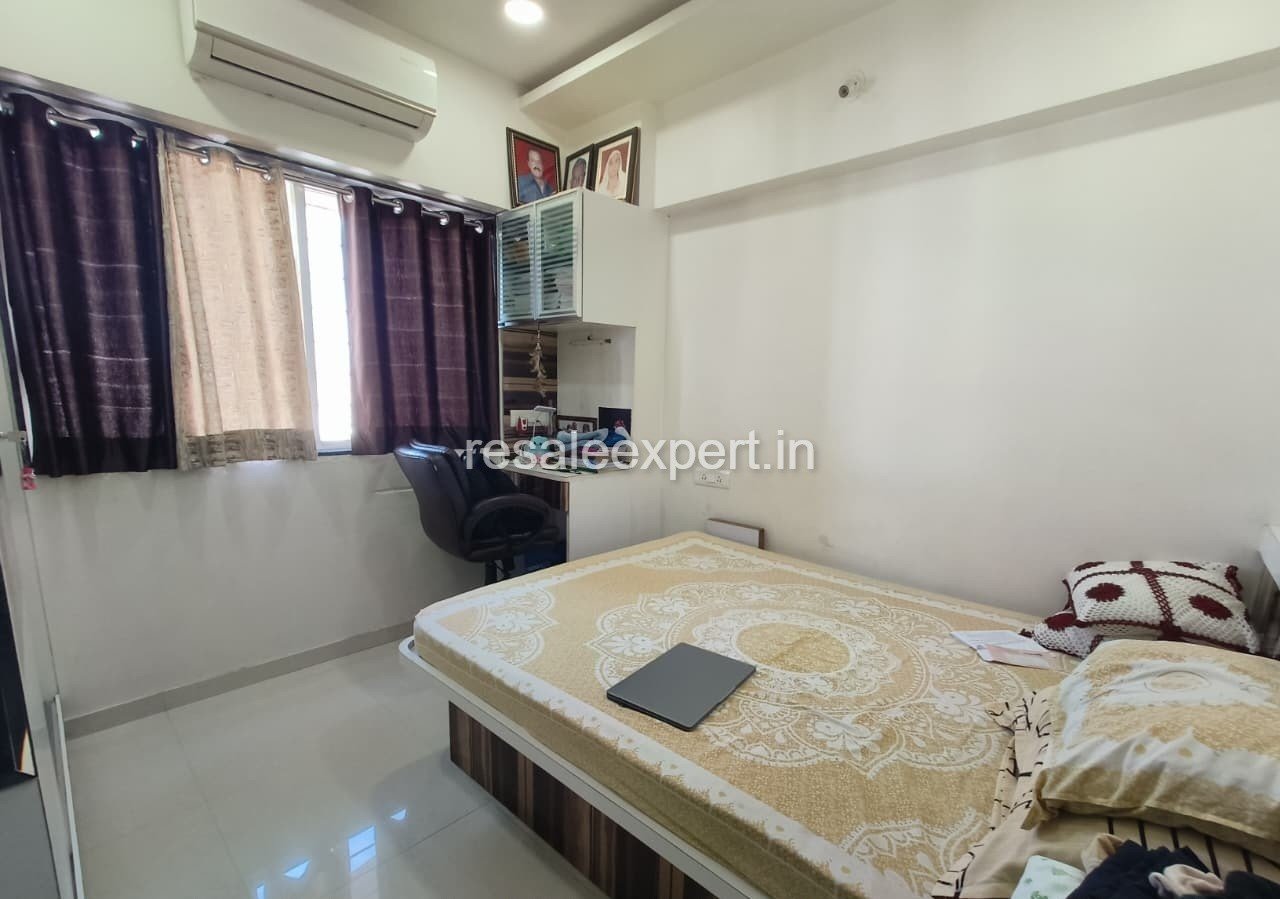 Cozy bedroom of 2 BHK Furnished Flat in Rahatani