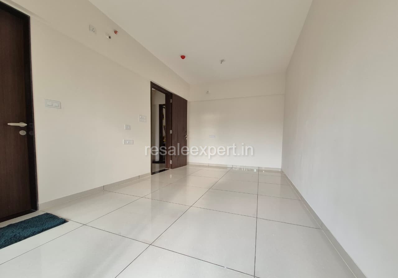 Master bedroom with large windows and serene ambiance in 2 BHK flat in Wakad