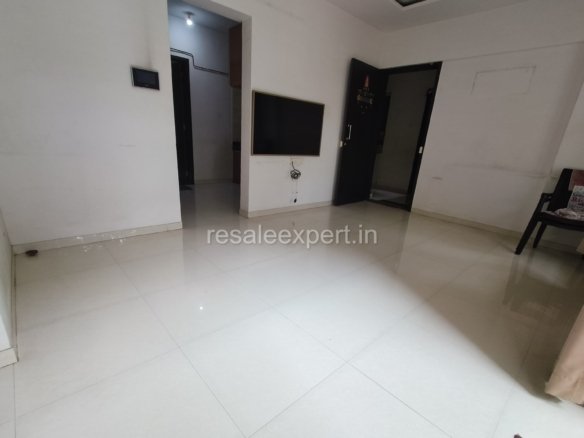 Elegant living room space in 2 BHK flat in Rahatani, ideal for small families