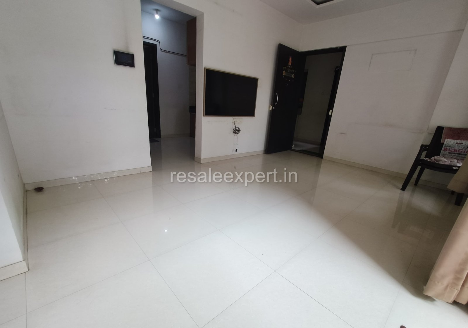 Elegant living room space in 2 BHK flat in Rahatani, ideal for small families