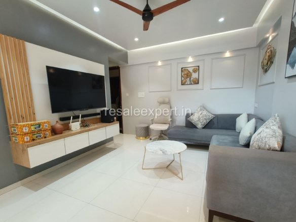 Neatly furnished hall with ample natural light
