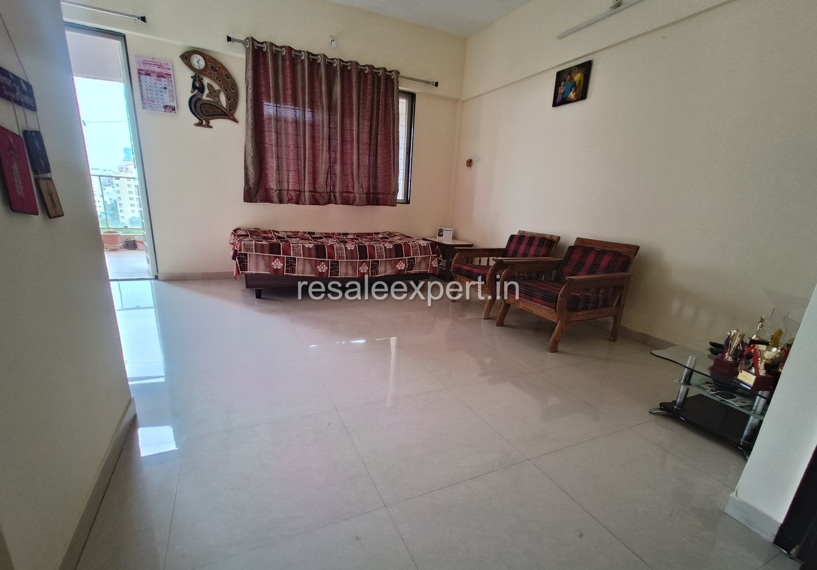 Garden-facing hall of Rahatani 2 BHK Flat with Immediate Possession