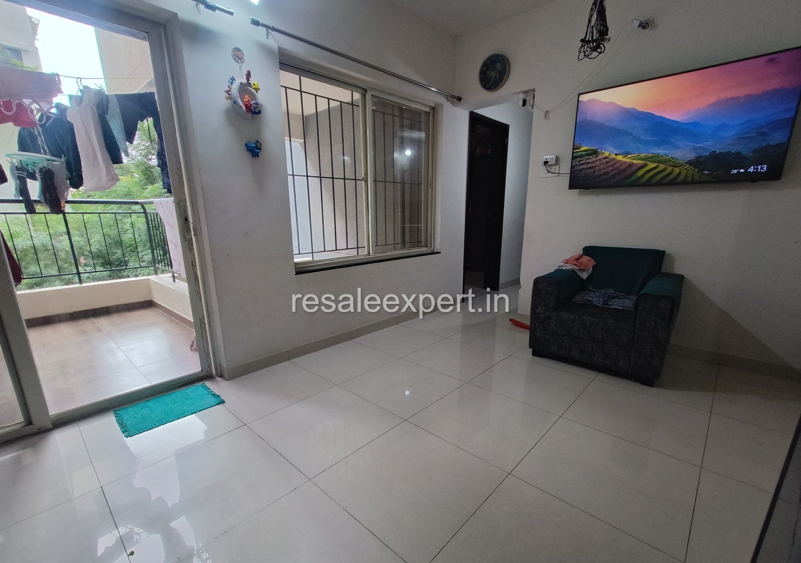 Well-ventilated hall area in Rahatani 2 BHK flat with spacious interiors