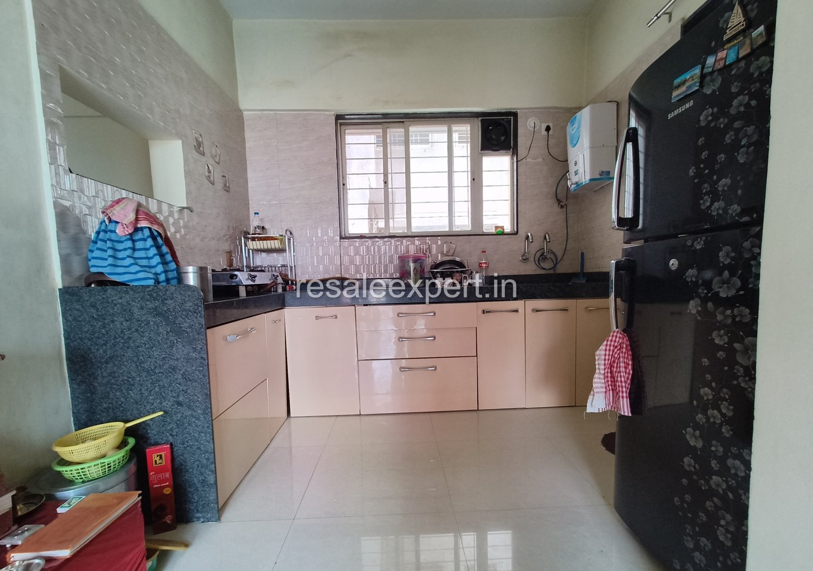 Clean and functional kitchen layout in Rahatani 2 BHK Flat with Immediate Possession