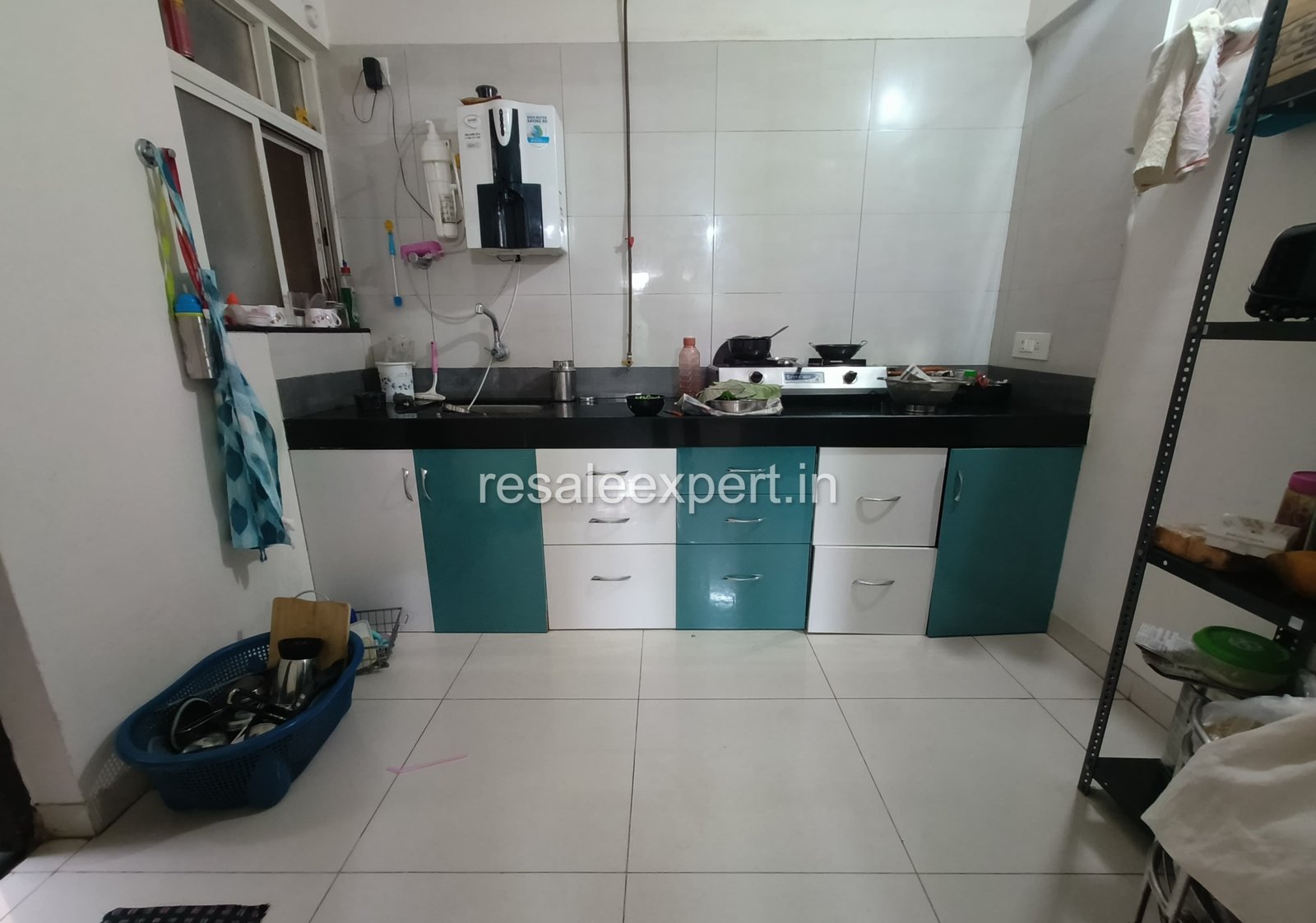 Clean and spacious kitchen setup in Rahatani ready possession flat