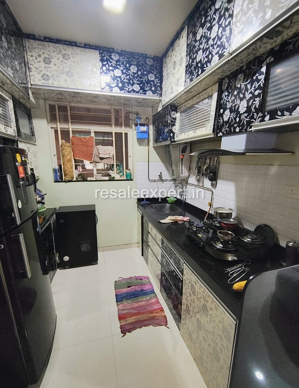 Well-maintained kitchen area in Furnished 2 BHK Flat in Tathawade