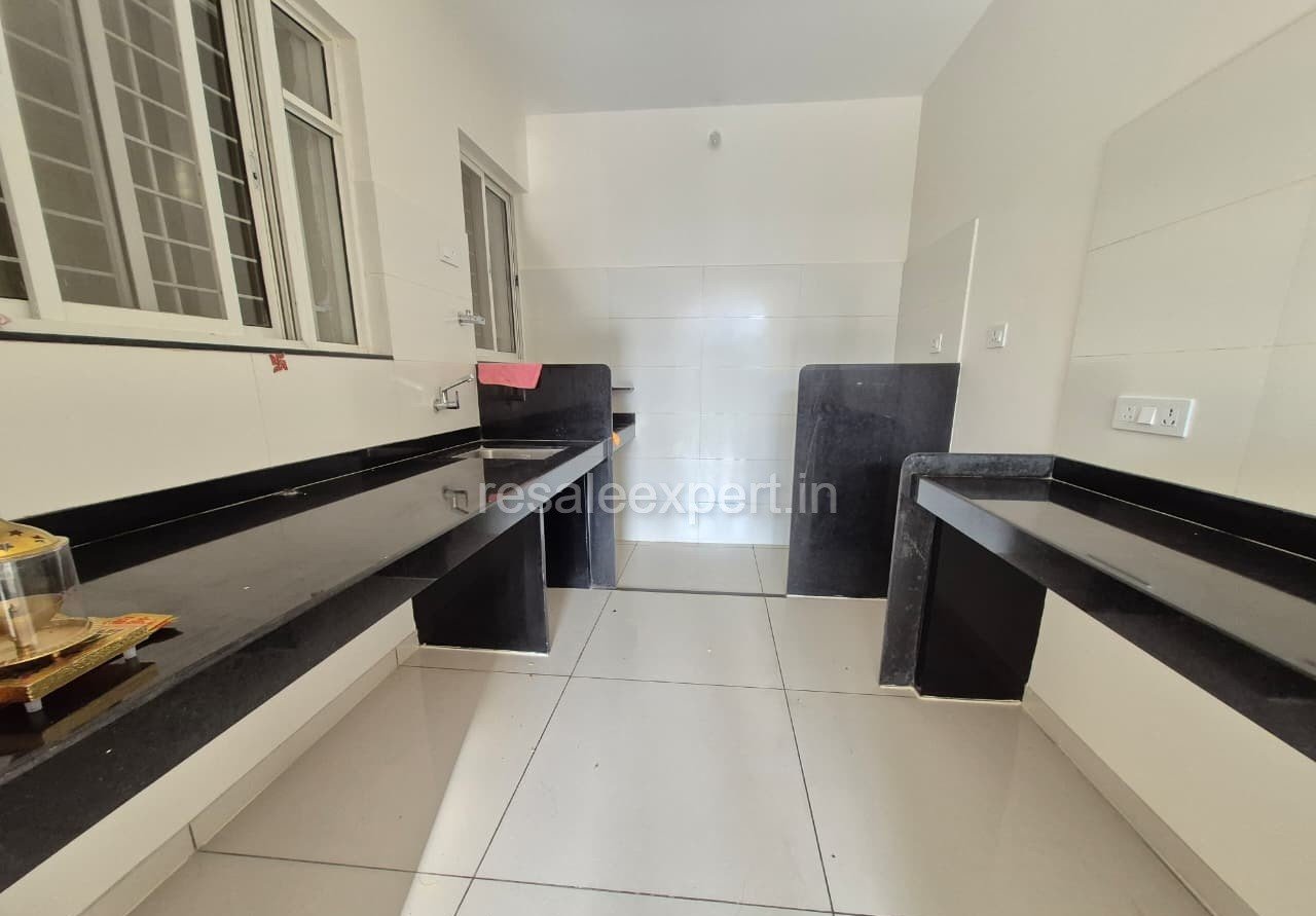 Well-planned kitchen area with modern layout in 2 BHK flat in Wakad