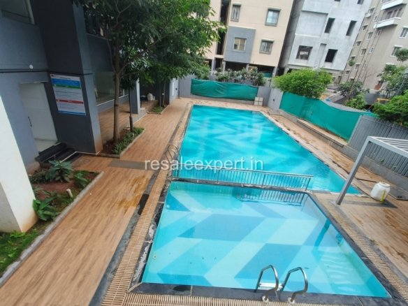Well-maintained swimming pool with deck in Rahatani project