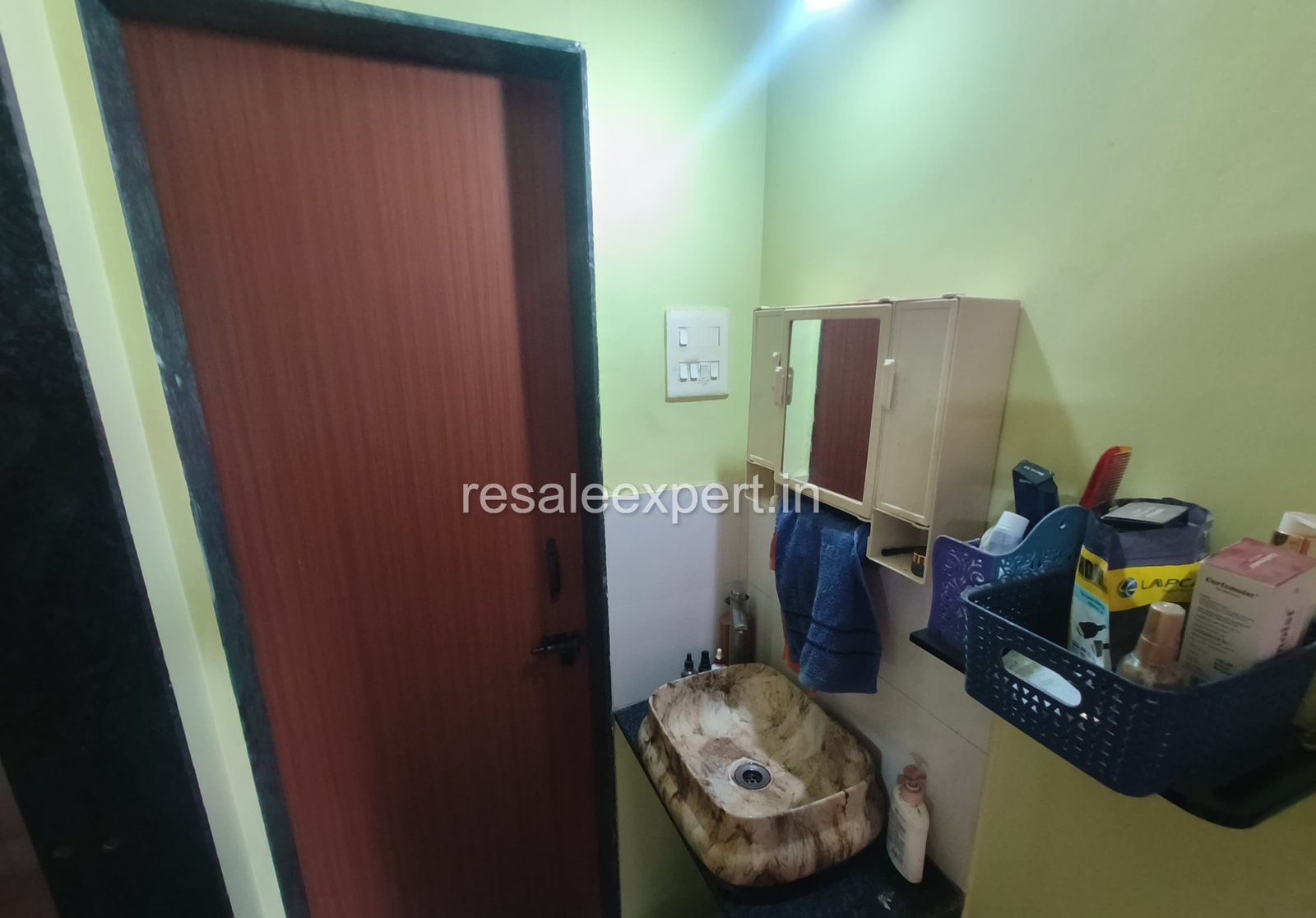 Compact basin area near bathroom in 1 BHK Flat in Rahatani